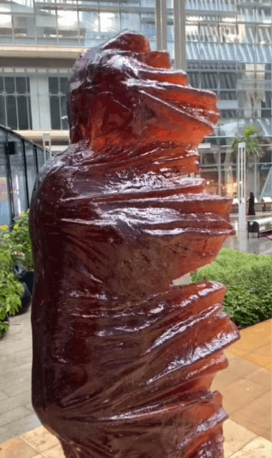 Amber resin sculpture, office courtyard