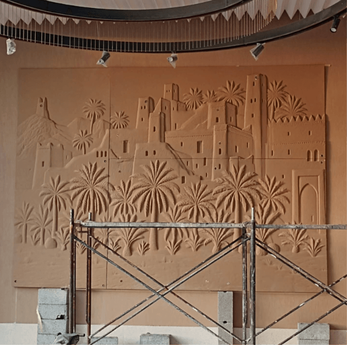 Relief mural during installation